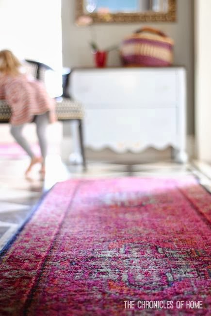 Bright rug with a checkerboard entryway floor - The Chronicles of Home
