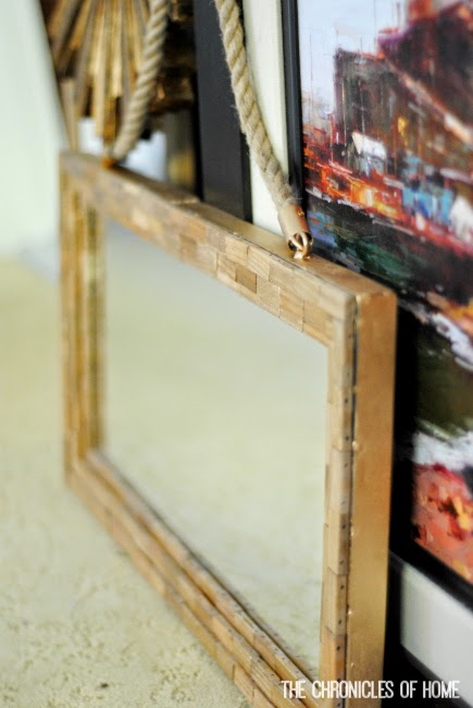 Take a plain old bamboo bathmat and turn it into a gold-leafed tiled mirror frame!  The Chronicles of Home shows you how.
