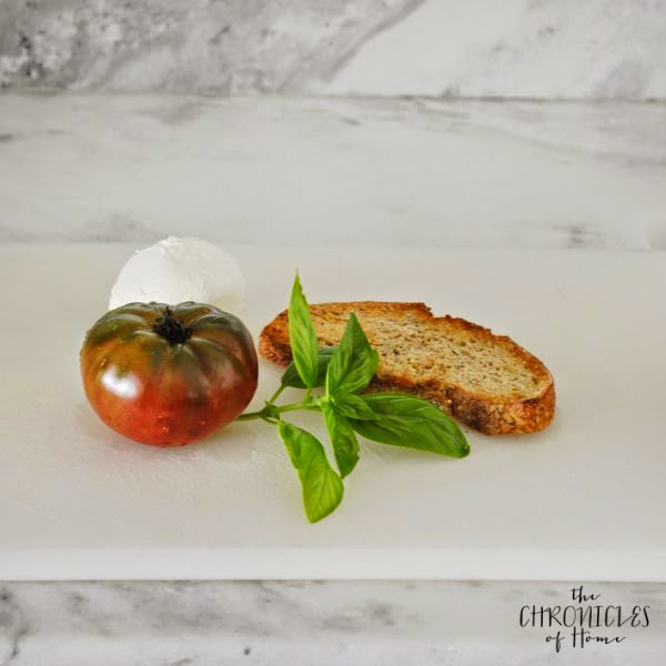 burrata (fresh mozzarella + cream) and tomato tartine - so easy, soooo good