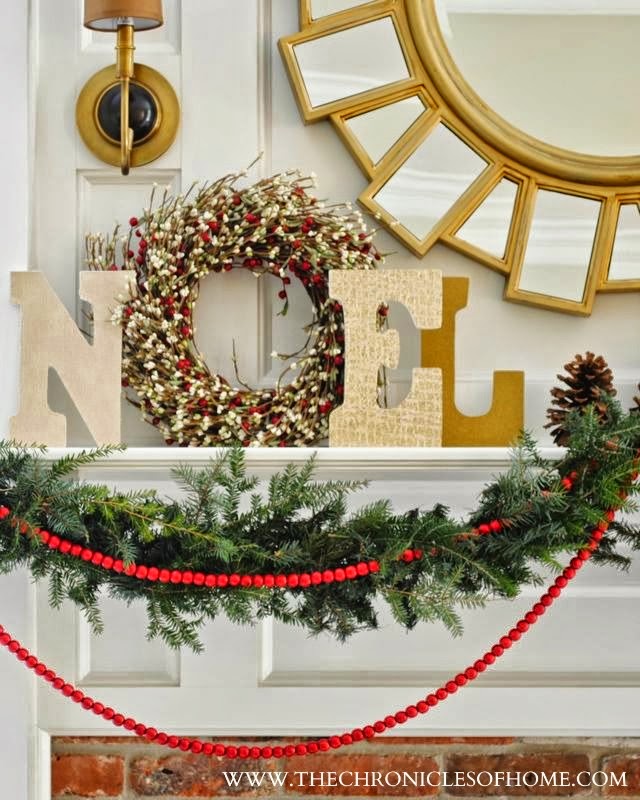 Easy NOEL display using craft store letters, scrapbook paper, and a wreath