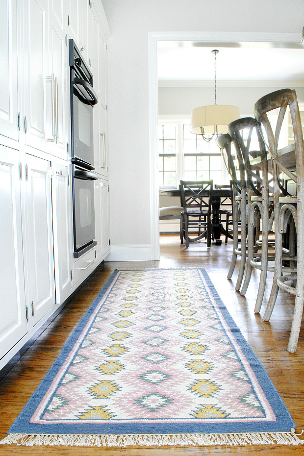 Colorful kitchen runner with navy blue, pink, and yellow