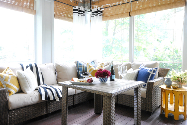 Fall porch with plaid, velvet, and faux fur in shades of blue and yellow