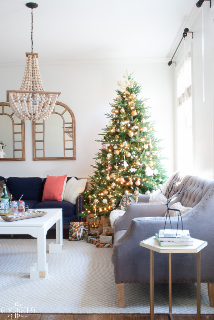 Festive but simple Christmas living room. Modern yet classic with touches blush, coral, and dark green.