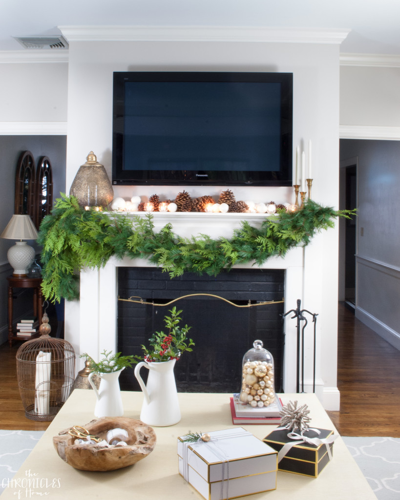 A thick, lush, striking garland made from a mix of faux and real greenery