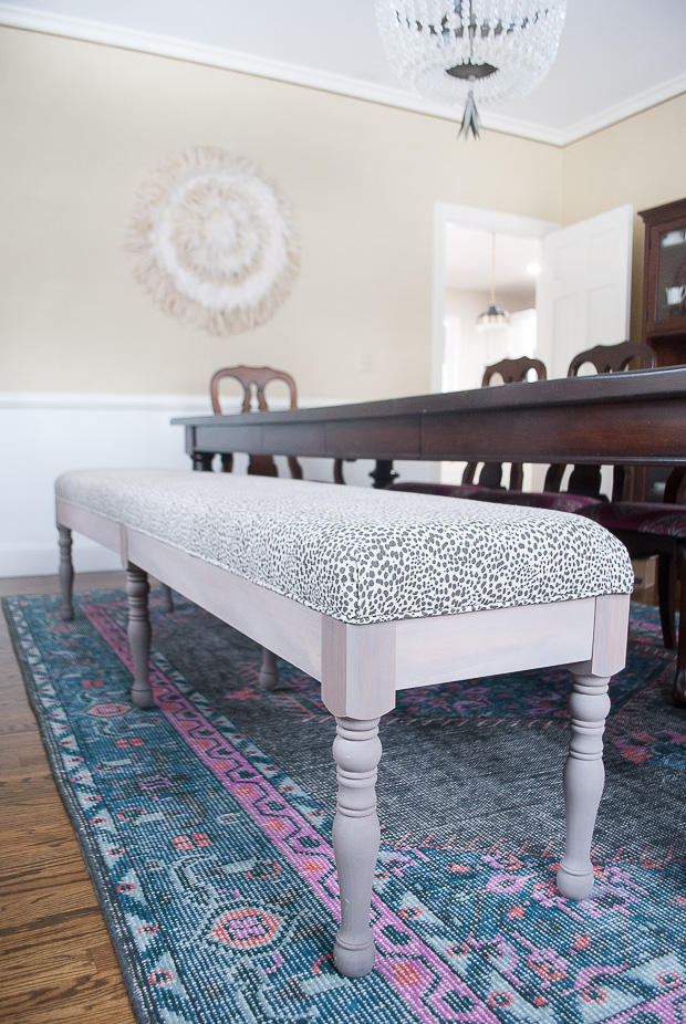 An easy-to-follow tutorial for building this gorgeous upholstered dining bench yourself! A DIY dining bench anyone can do.