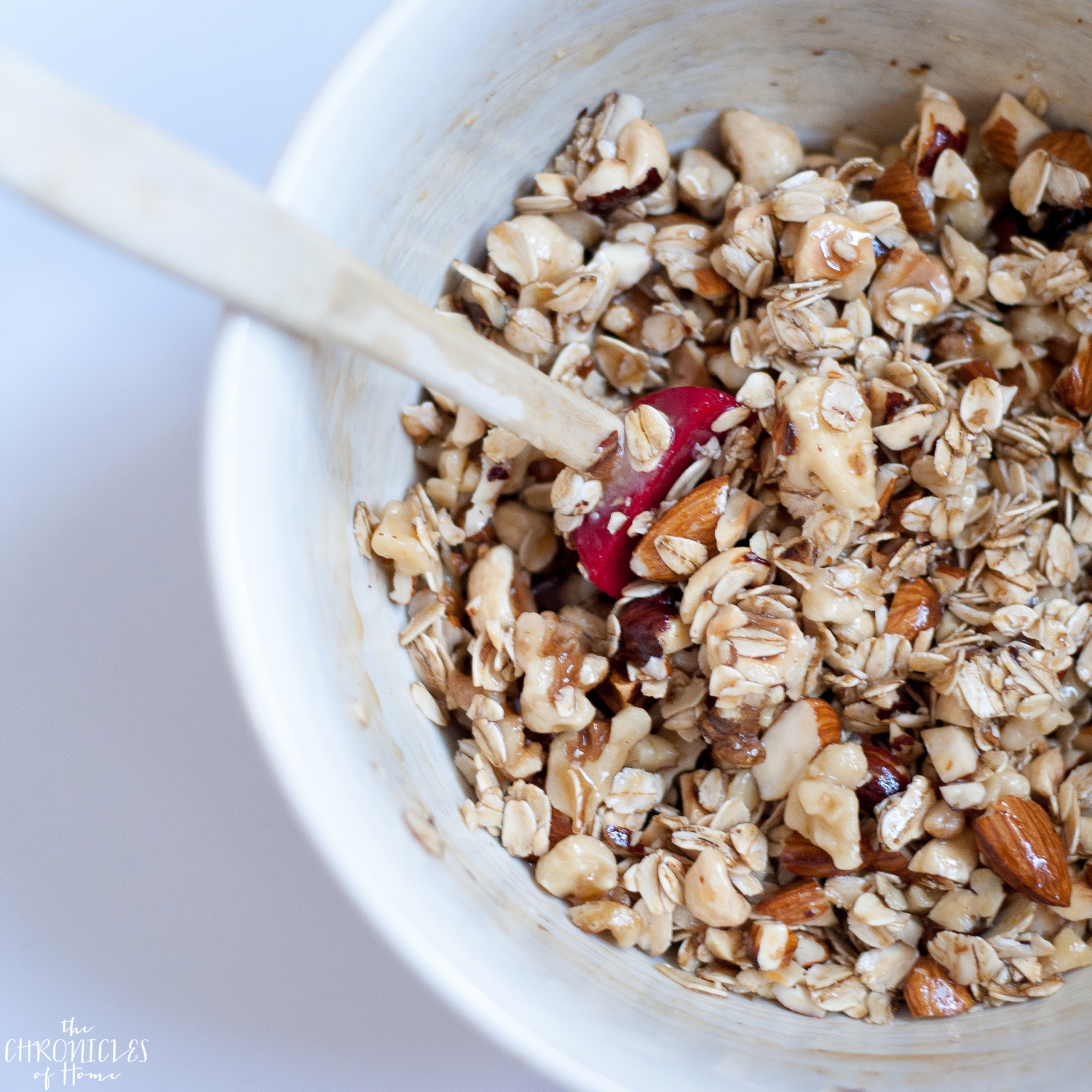 Oat and nut breakfast crumble - healthy, hearty, and delicious with nuts, seeds, fresh fruit, and an easy homemade cinnamon yogurt drizzle