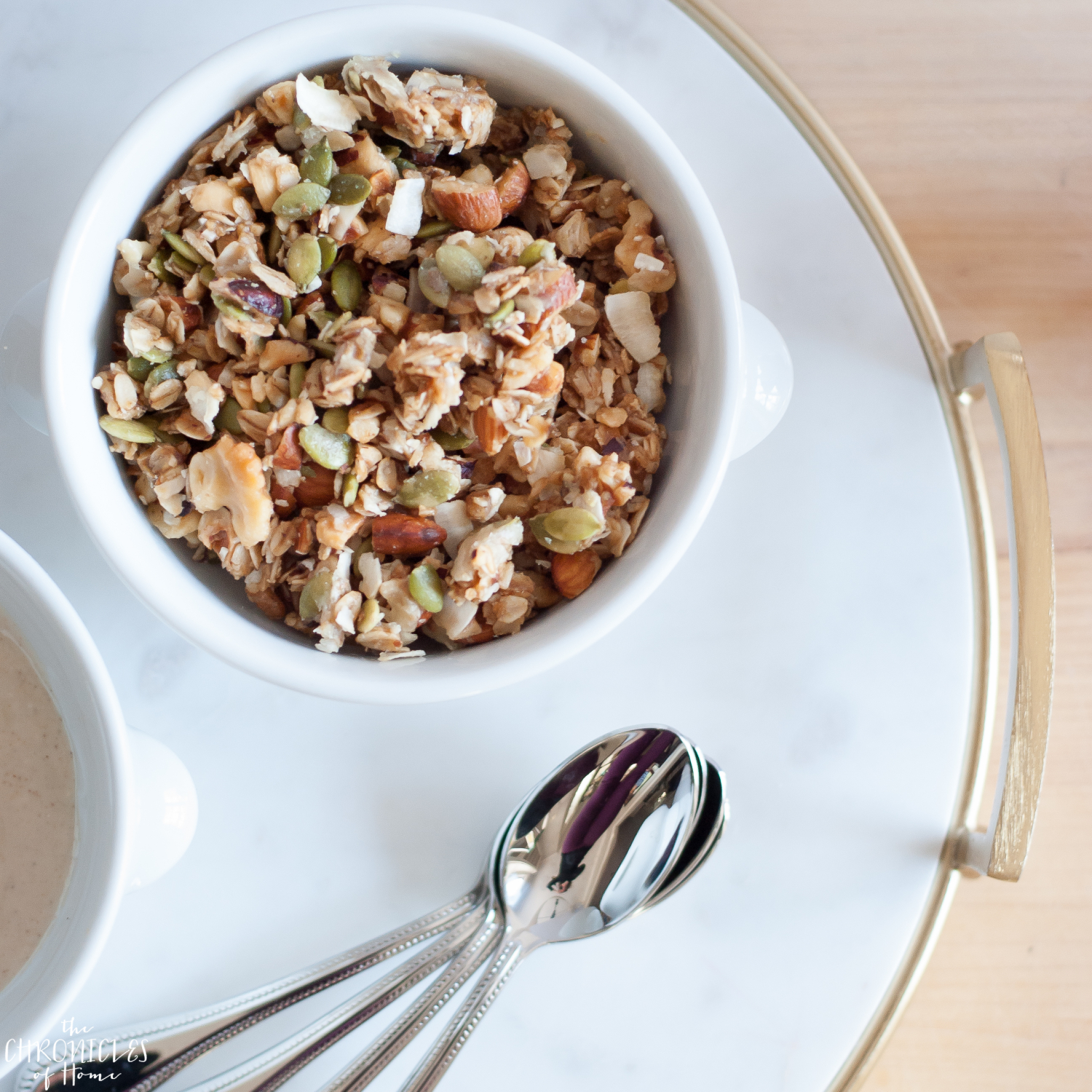 Oat and nut breakfast crumble - healthy, hearty, and delicious with nuts, seeds, fresh fruit, and an easy homemade cinnamon yogurt drizzle