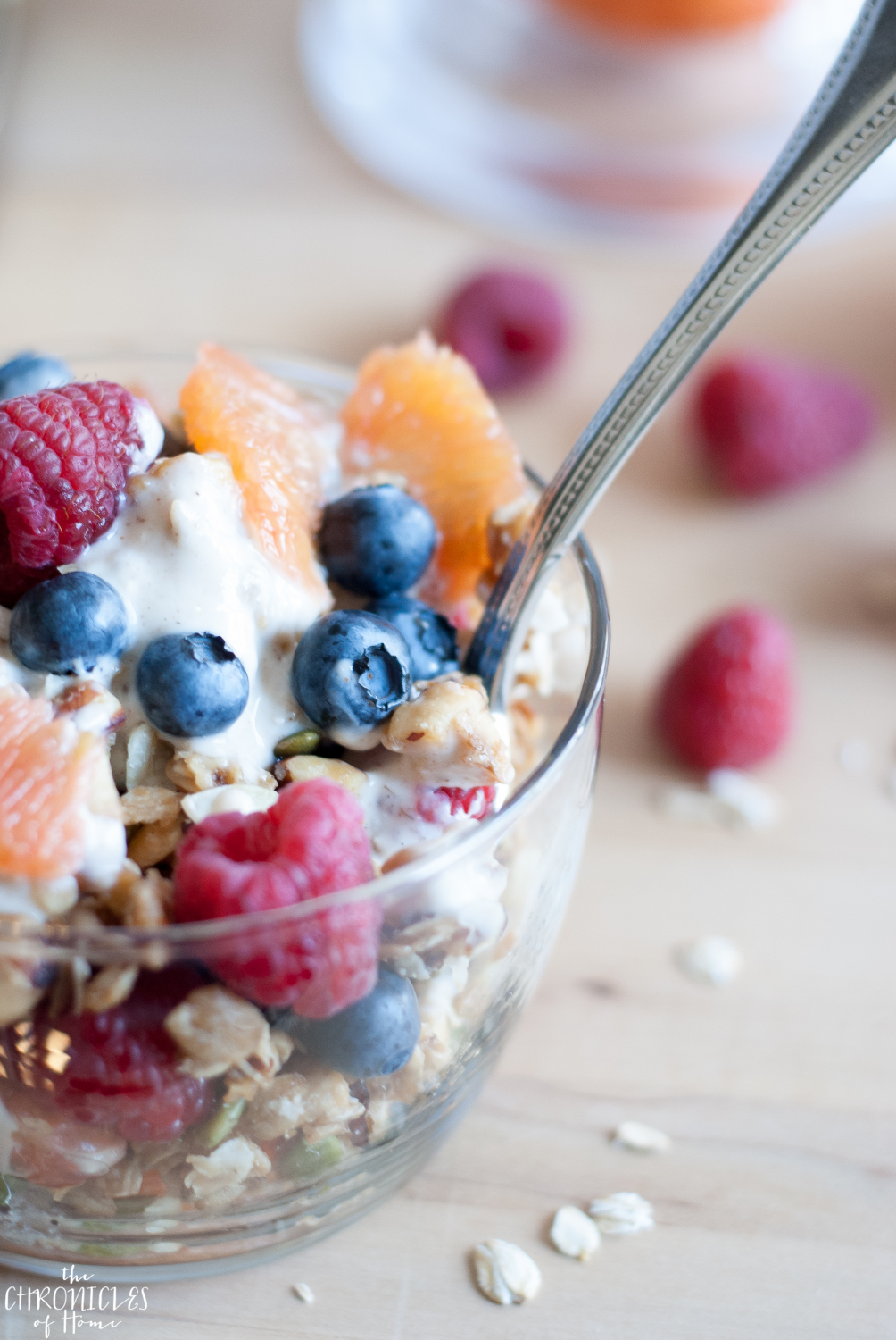 Oat and nut breakfast crumble - healthy, hearty, and delicious with nuts, seeds, fresh fruit, and an easy homemade cinnamon yogurt drizzle