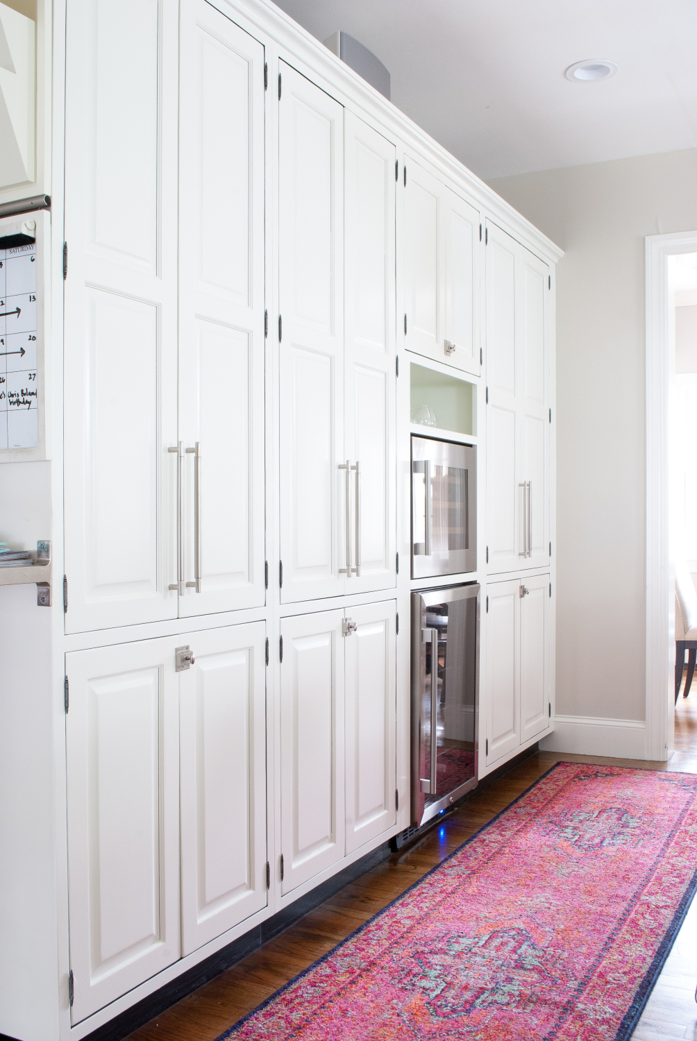 How to add a built in wine fridge and beverage fridge to existing cabinetry - it's simpler than you might think and adds great extra cold storage!