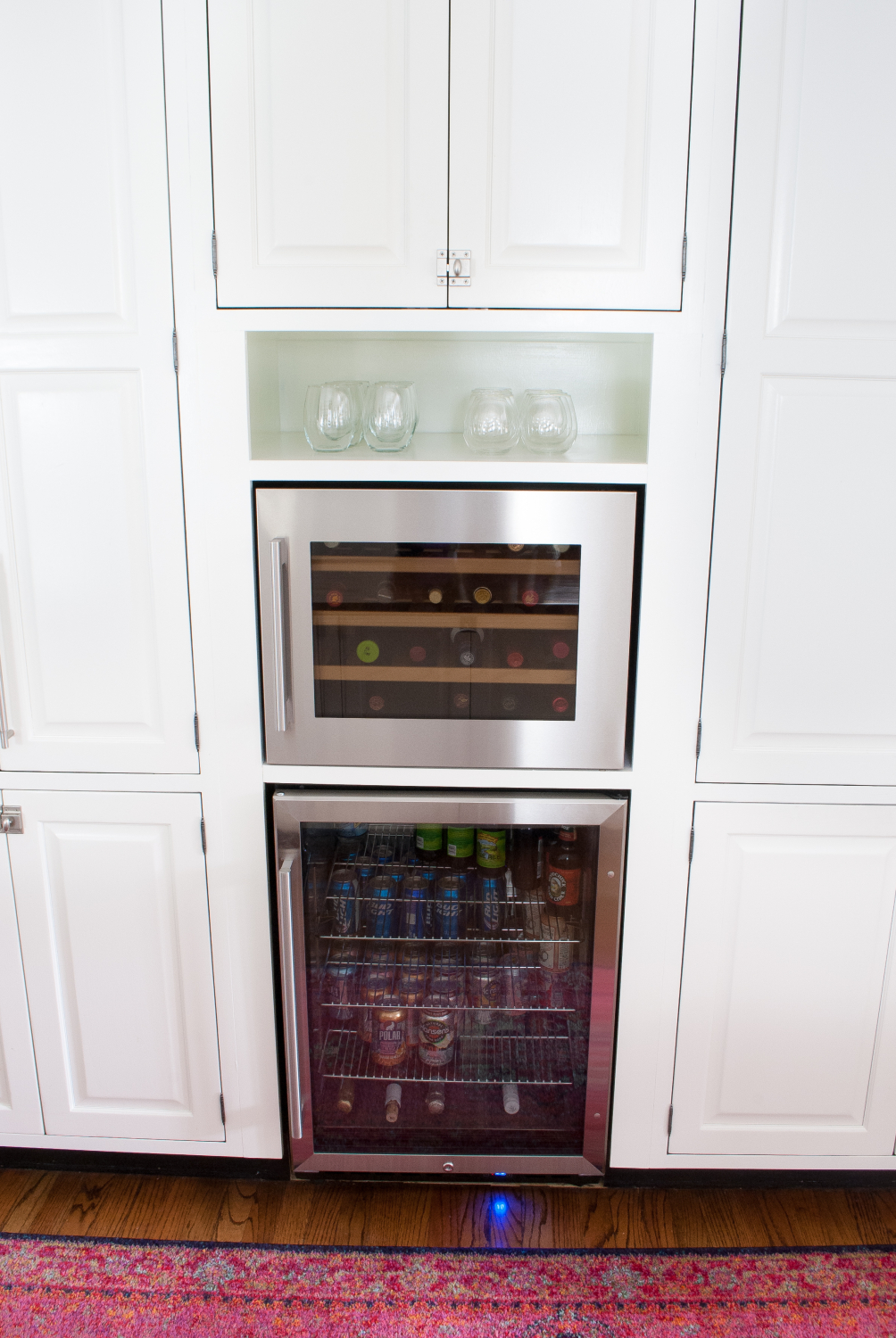 How to add a built in wine fridge and beverage fridge to existing cabinetry - it's simpler than you might think and adds great extra cold storage!