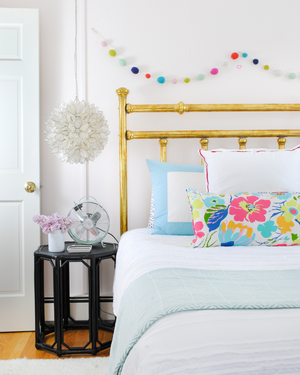 Beautiful neutral girl bedroom with navy blue, aqua, and pink accents - a bedroom to grow with a little girl.