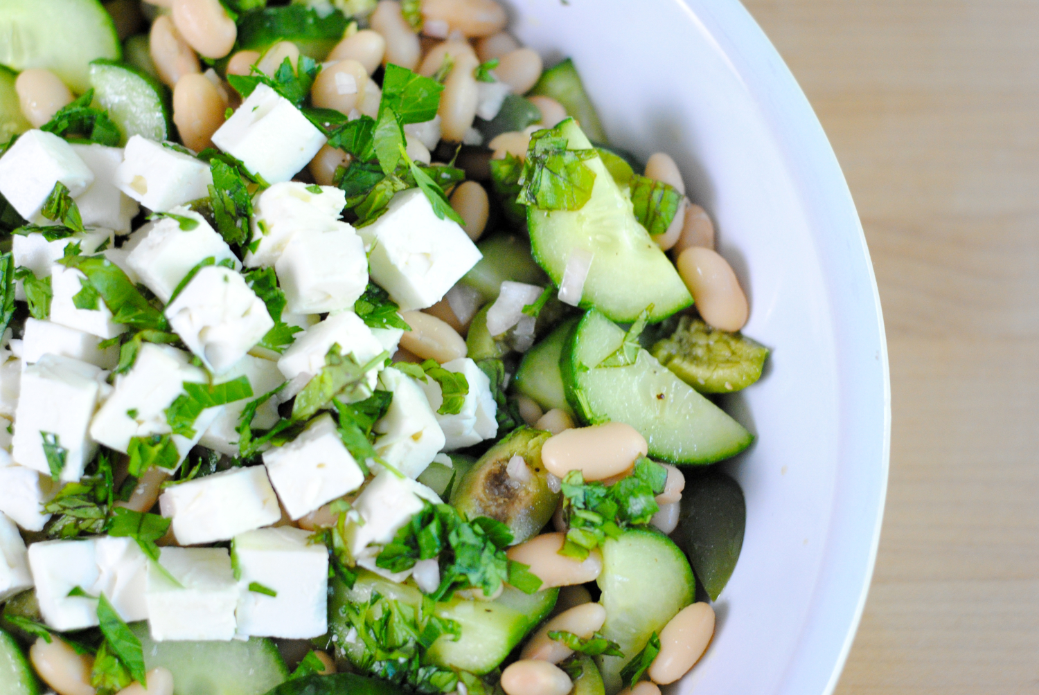 Perfect easy summer cucumber and white bean salad - so simple and so super delicious! An excellent vegetarian meal or side salad with grilled fish and meats.