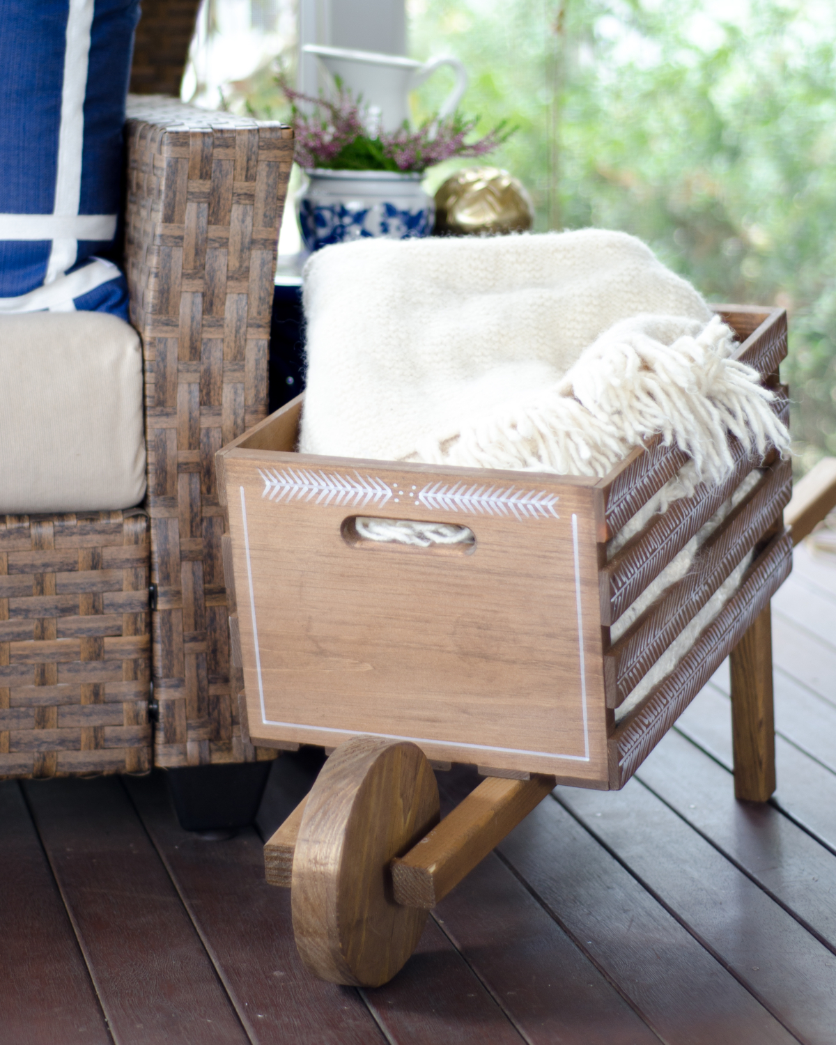 A DIY rustic wheelbarrow with a hand-painted herringbone pattern, perfect for all kinds of fall decorating! #DIHWorkshop #sponsored