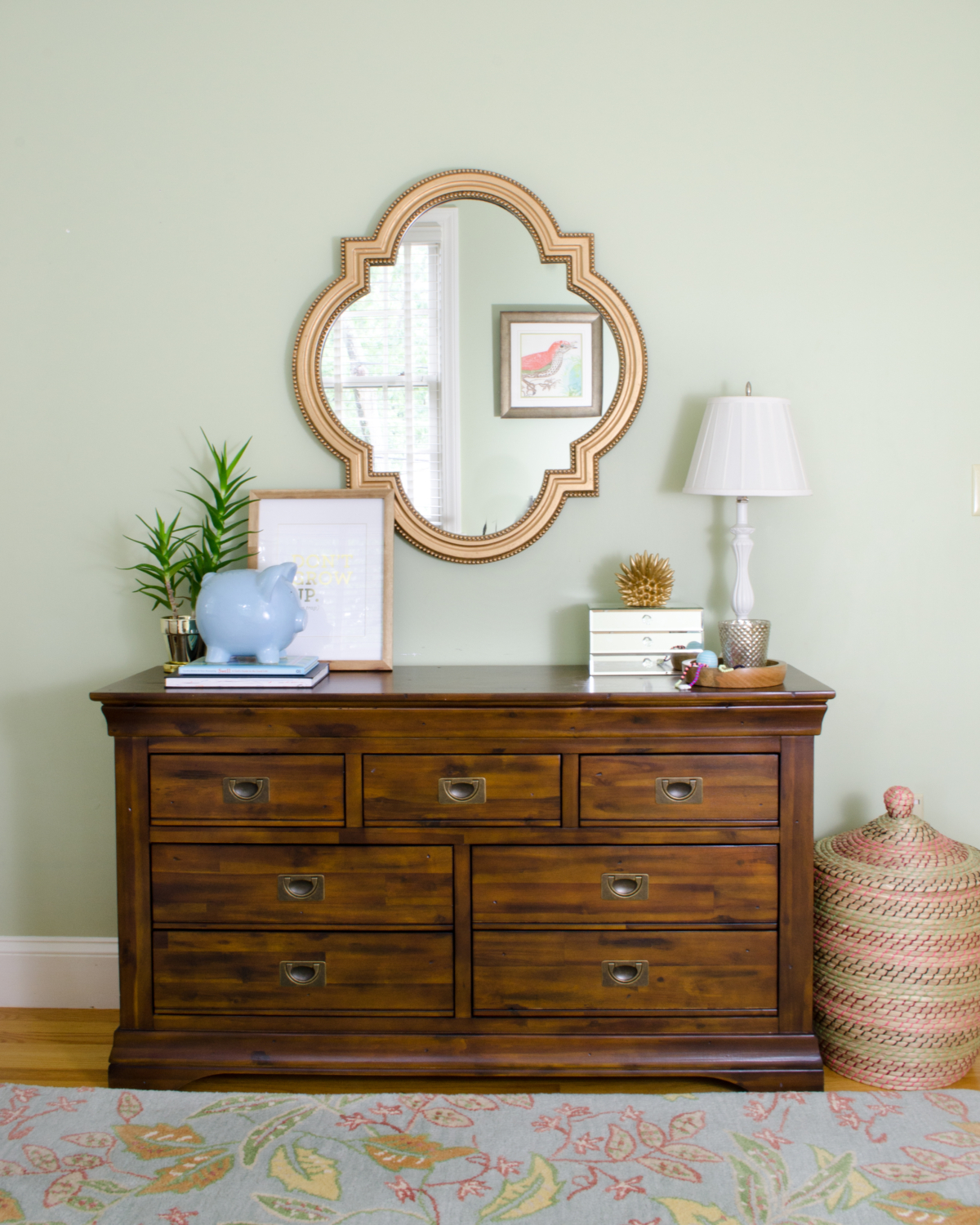 Hardwood dresser with campaign pulls (SUPER affordable) in a darling girl's bedroom