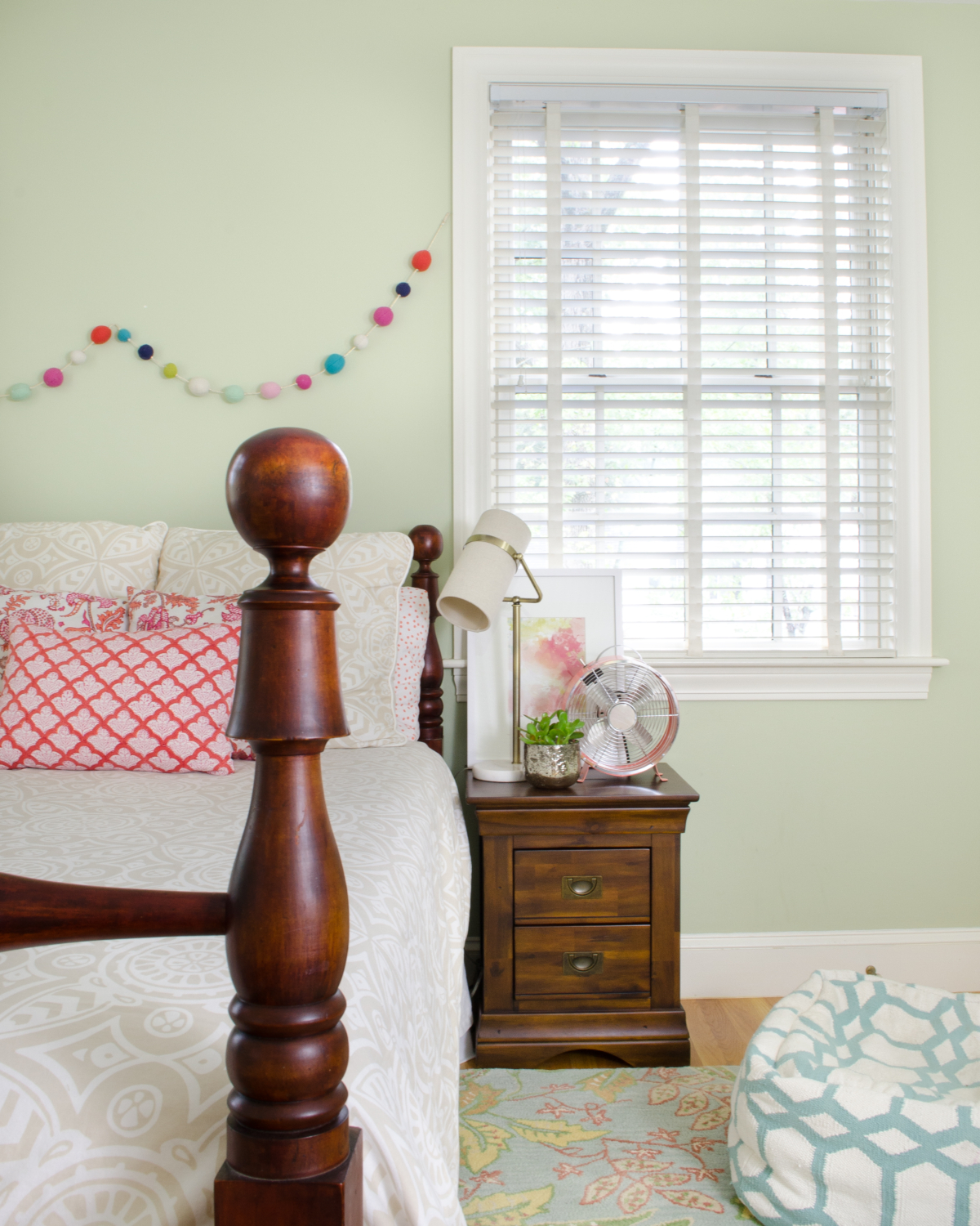 Hardwood dresser with campaign pulls (SUPER affordable) in a darling girl's bedroom