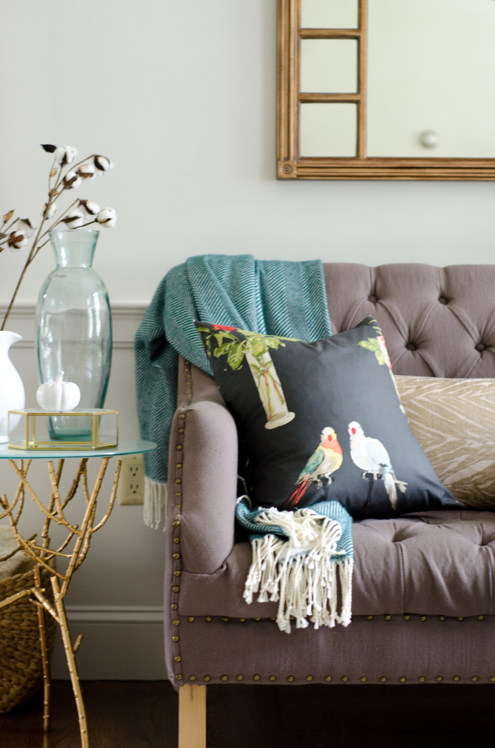 Fresh classic fall living room with teal, yellow, and coral accents