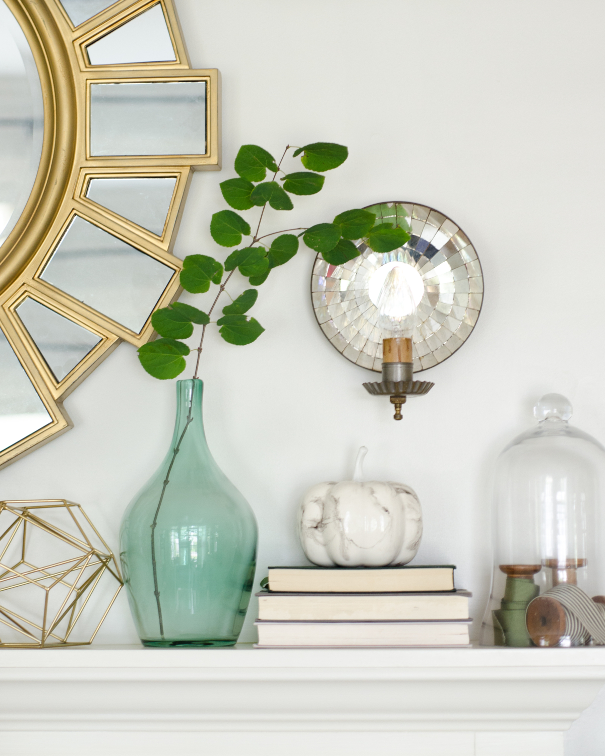 Classic layered fall mantle with green, gold, white, and teal