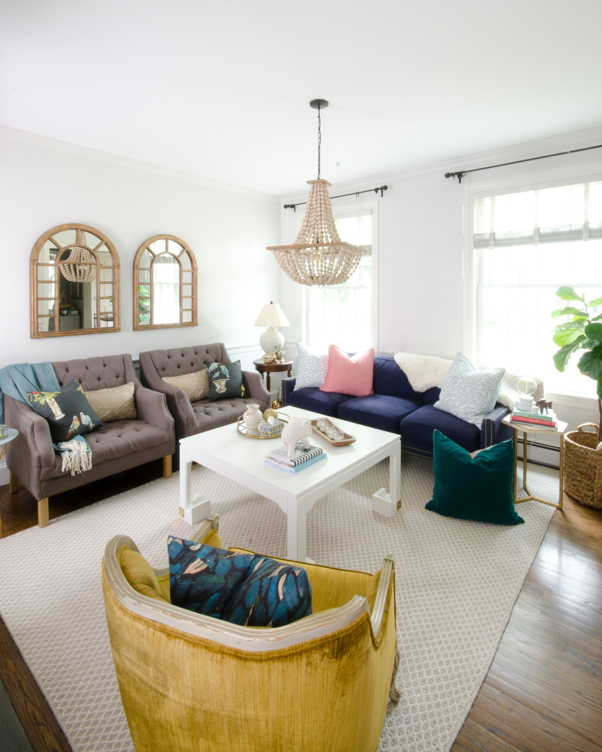 Fresh classic fall living room with teal, yellow, and coral accents