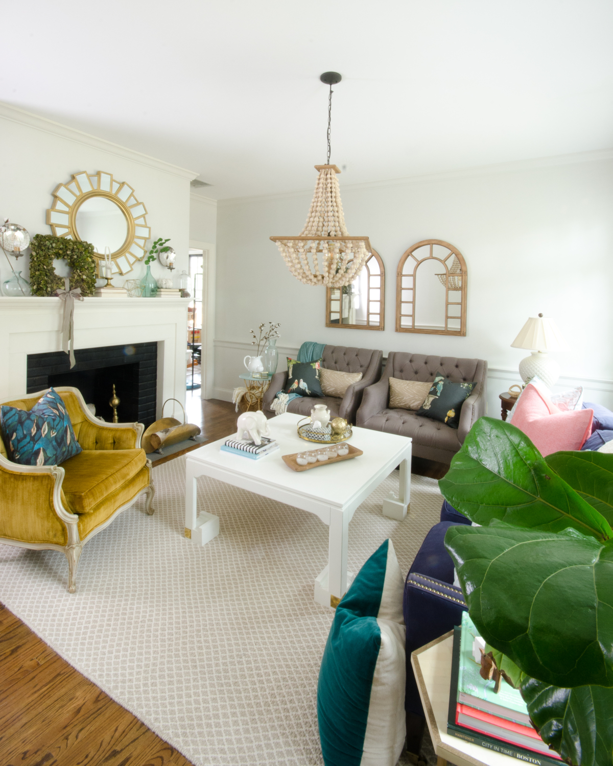 Fresh classic fall living room with teal, yellow, and coral accents