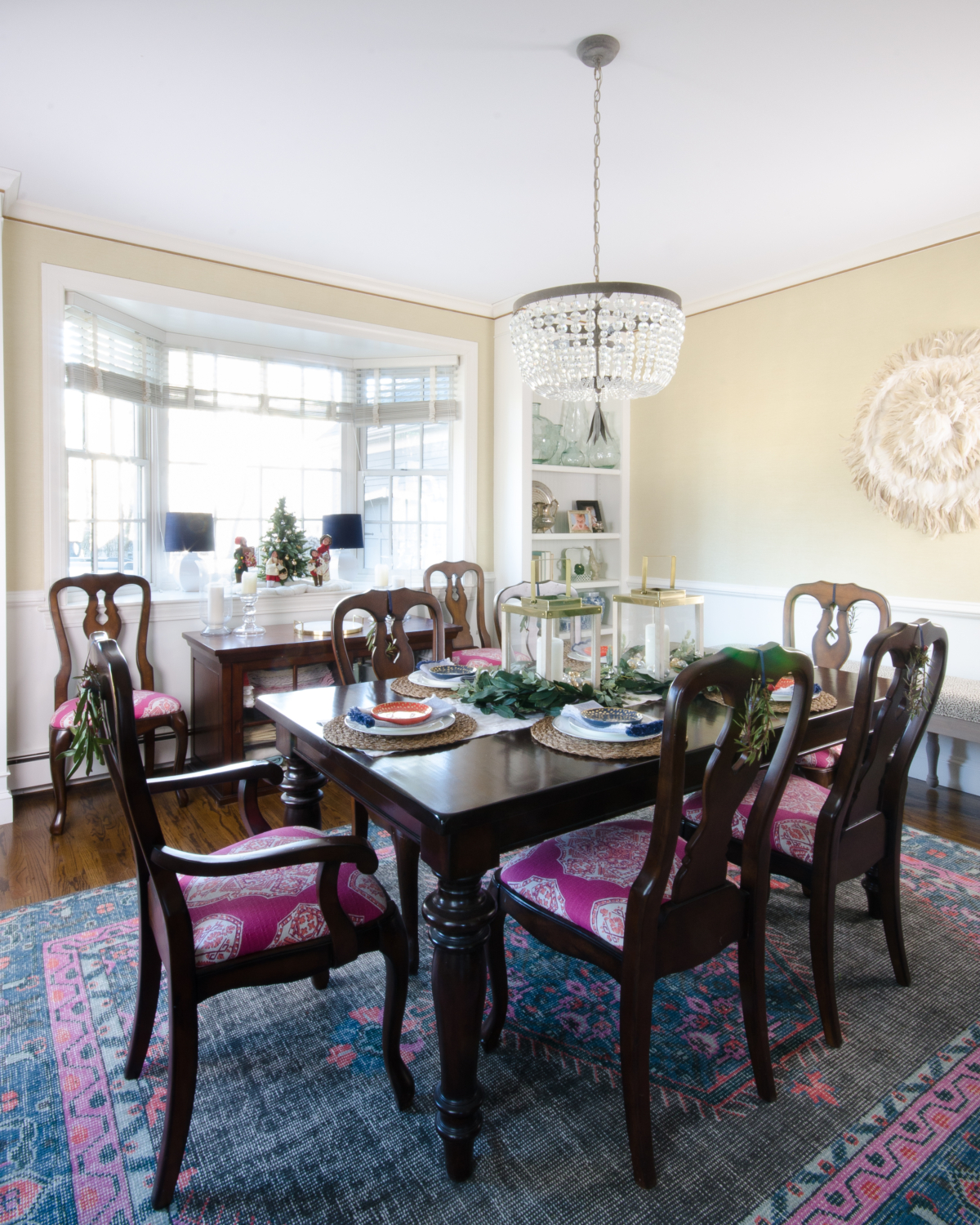 Christmas dining room with simple candle lantern centerpiece