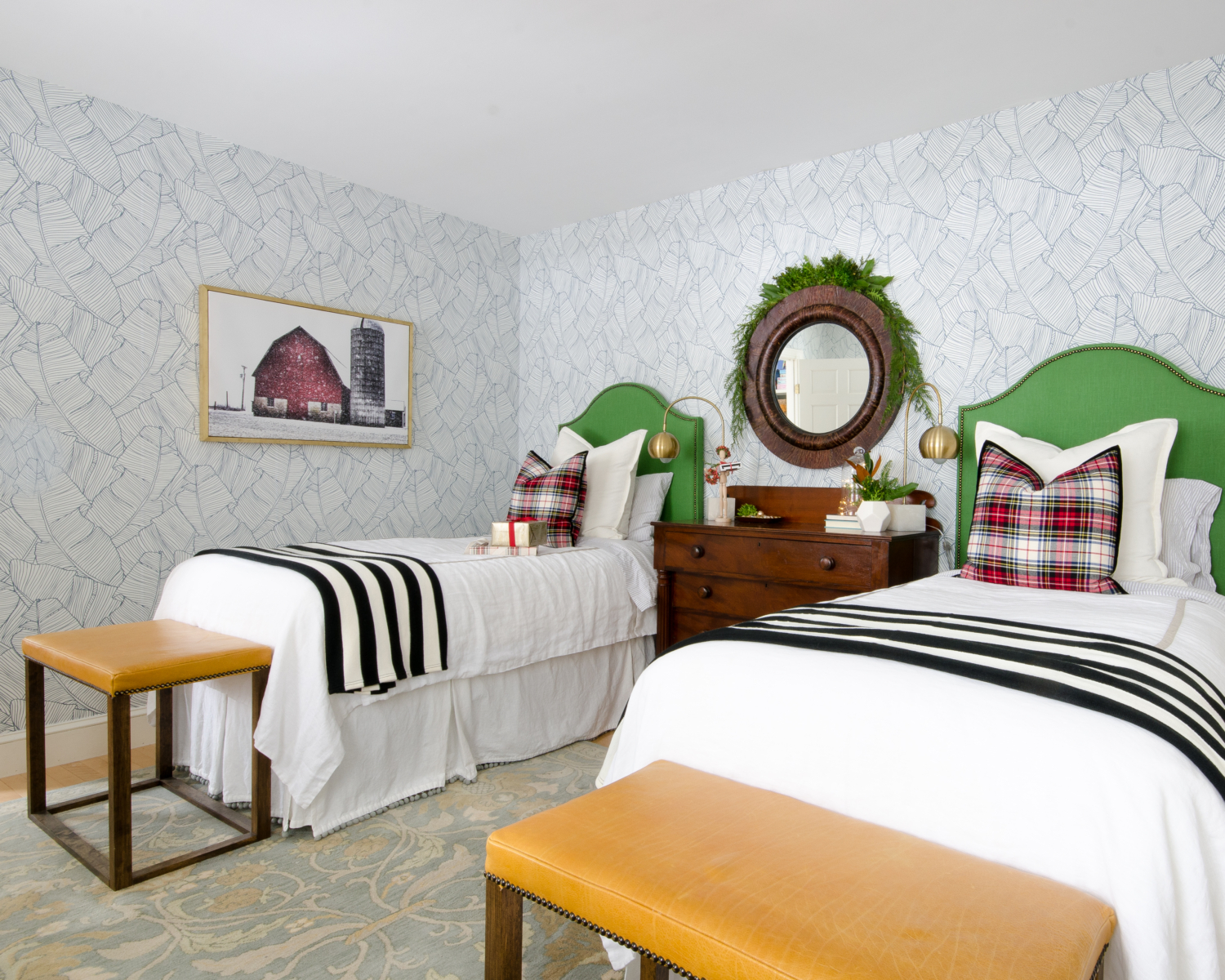 Classic Christmas guest room with custom DIY upholstered headboards, red plaid pillows, fresh greenery, and cute, quirky accents. Perfect way to make Christmas guest feel at home!