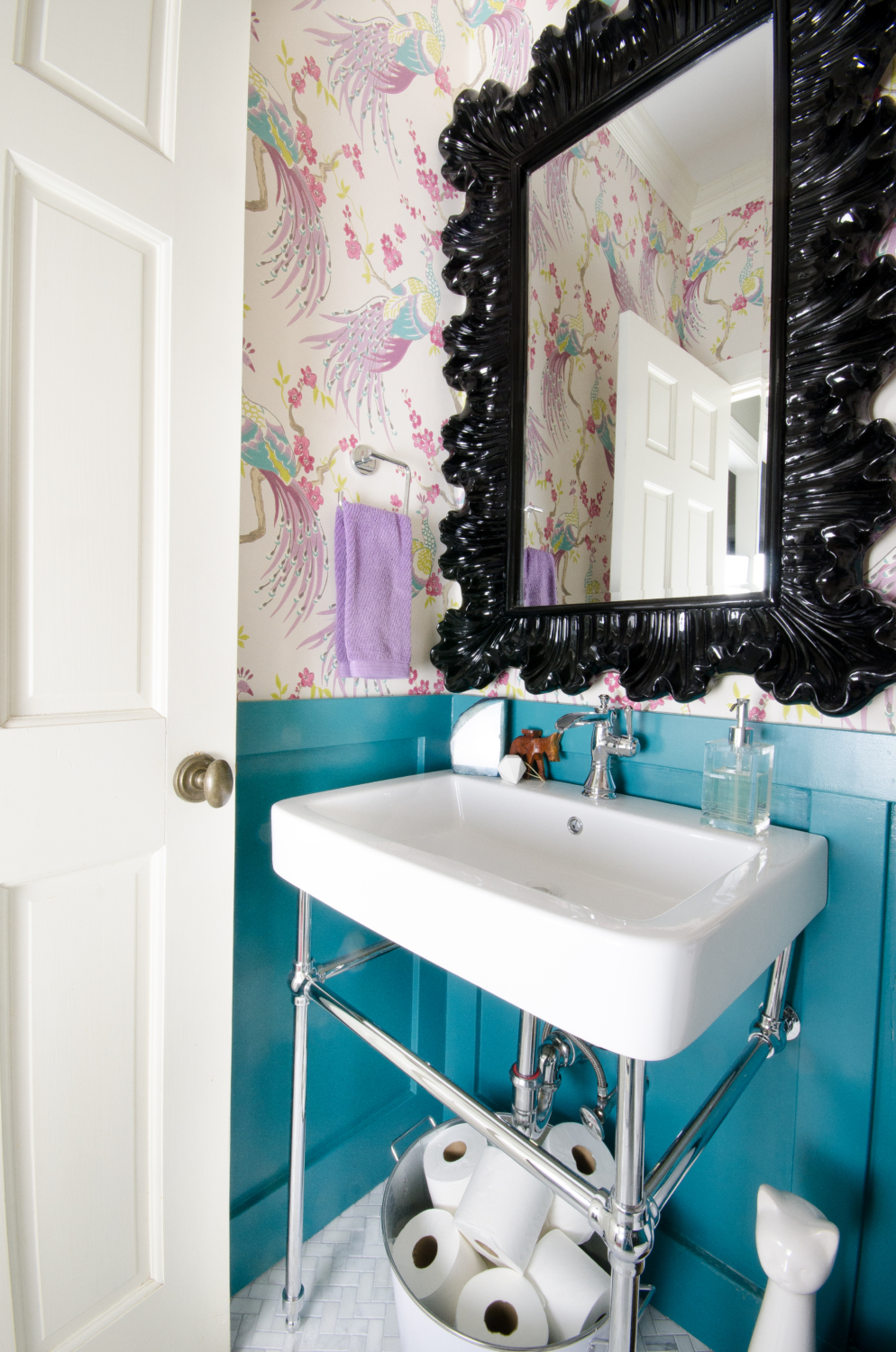 This gorgeous chrome console sink is perfect for a small powder room!