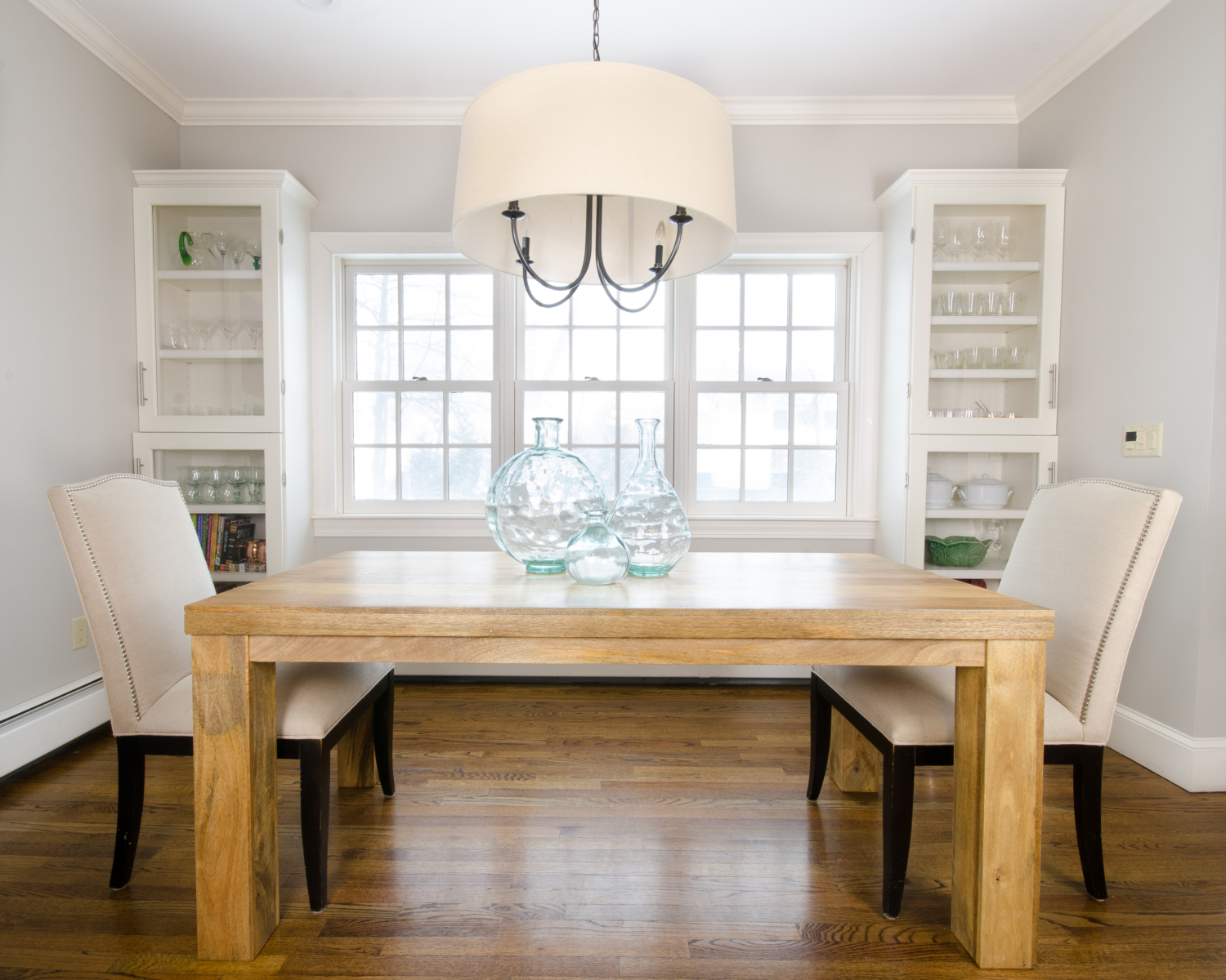 An affordable farmhouse table for under $350 with free shipping. See how it fits into plans for a stylish, family-friendly breakfast nook.