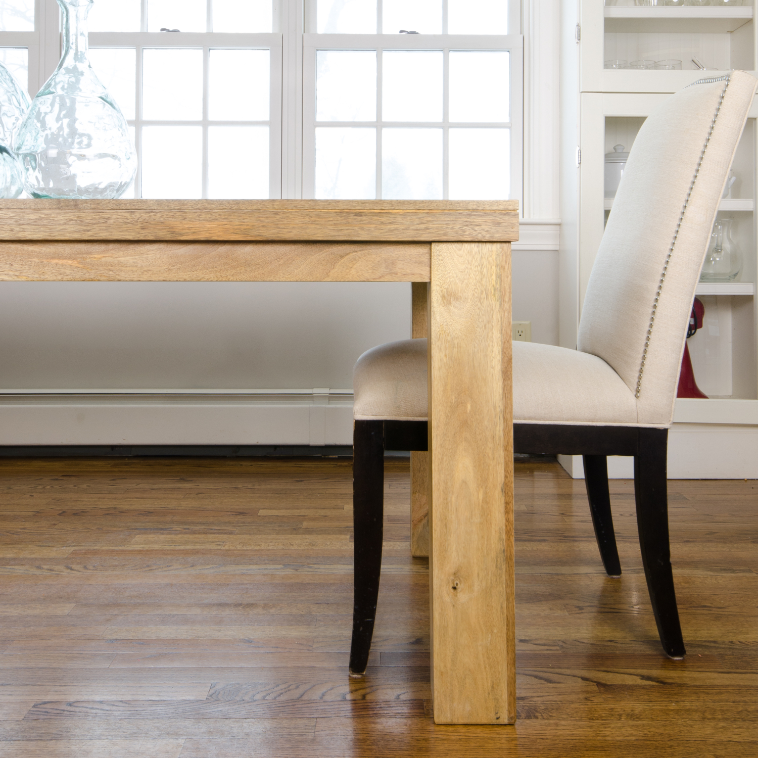 An affordable farmhouse table for under $350 with free shipping. See how it fits into plans for a stylish, family-friendly breakfast nook.