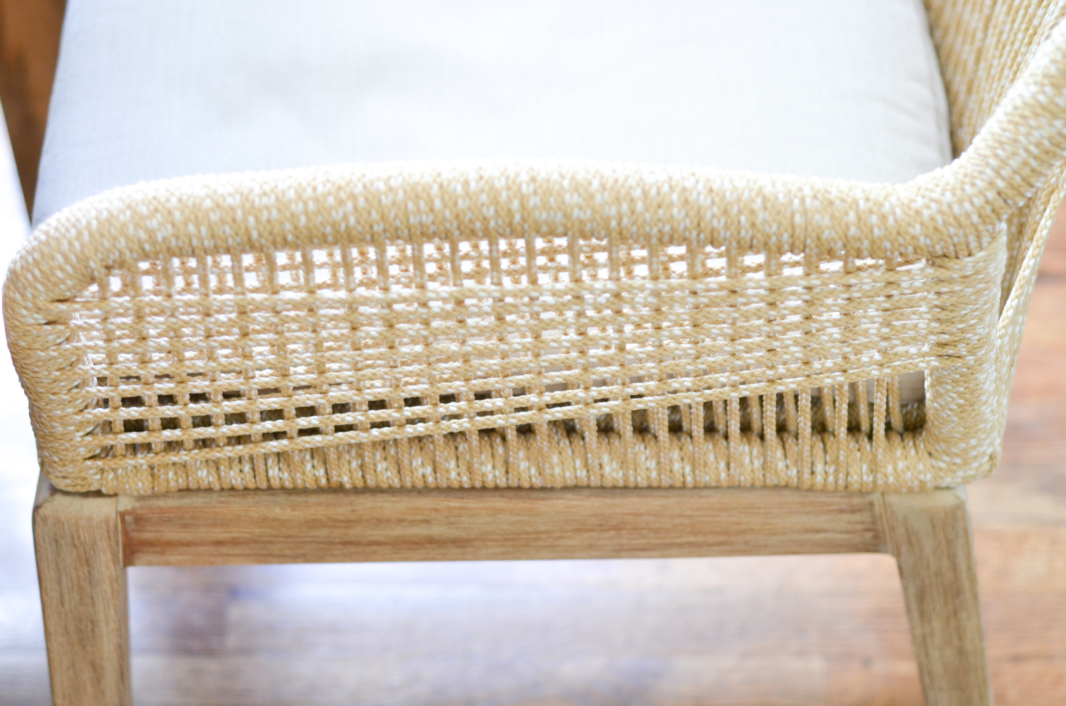 Beige rope chairs are a stunning addition to this chic yet family friendly breakfast nook makeover.