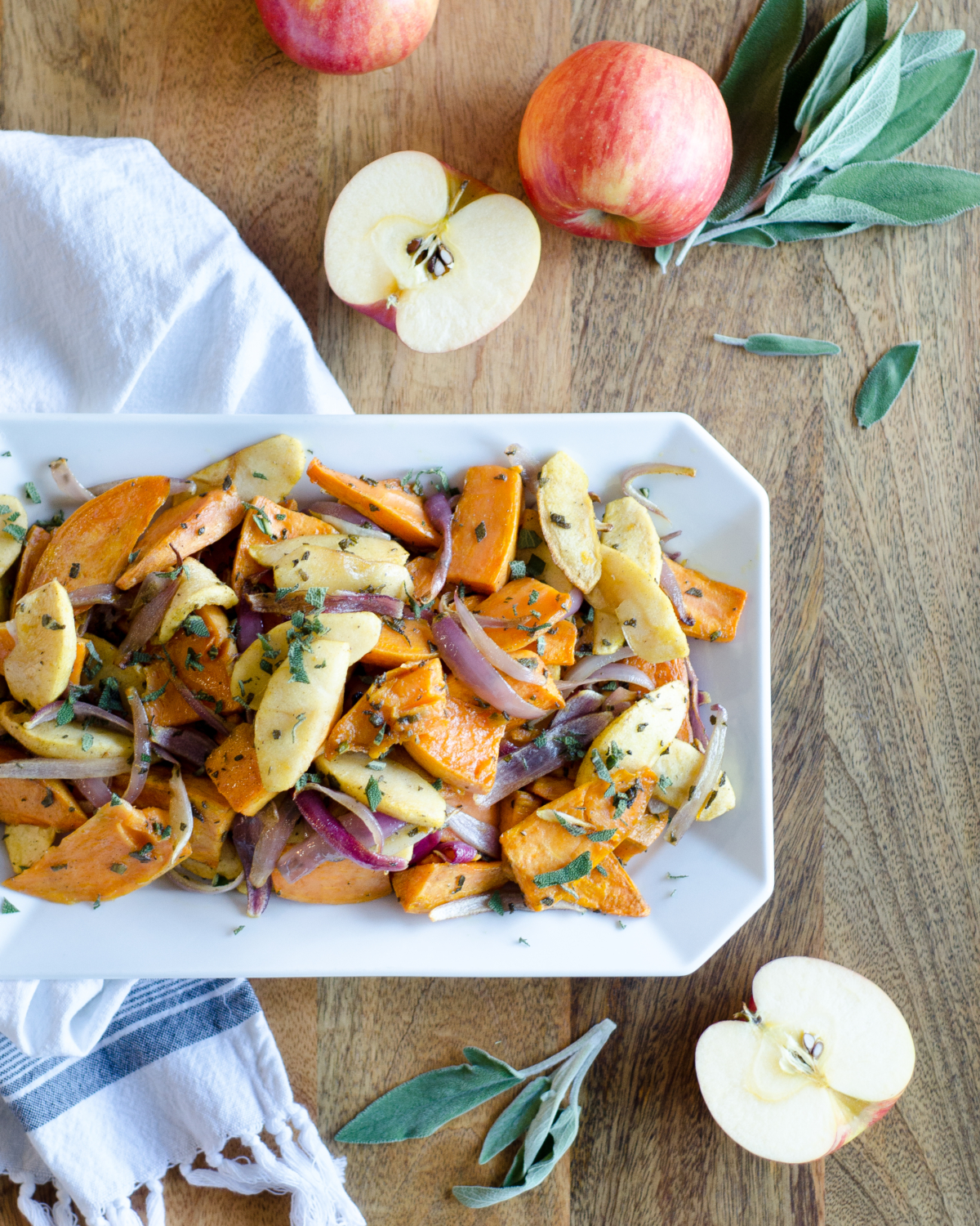 Recipe for roasted sweet potatoes and apples. An easy and delicious fall or winter side dish. Would be an excellent easy Thanksgiving side dish too!