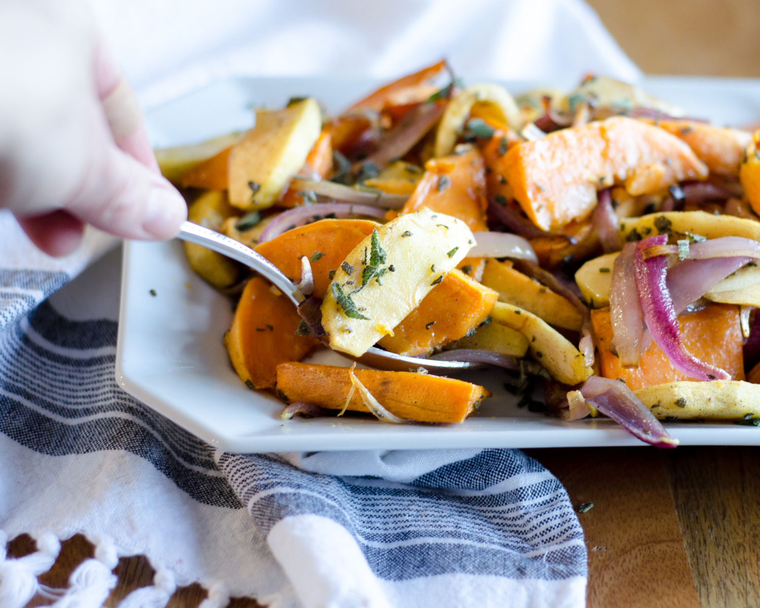 Recipe for roasted sweet potatoes and apples. An easy and delicious fall or winter side dish. Would be an excellent easy Thanksgiving side dish too!