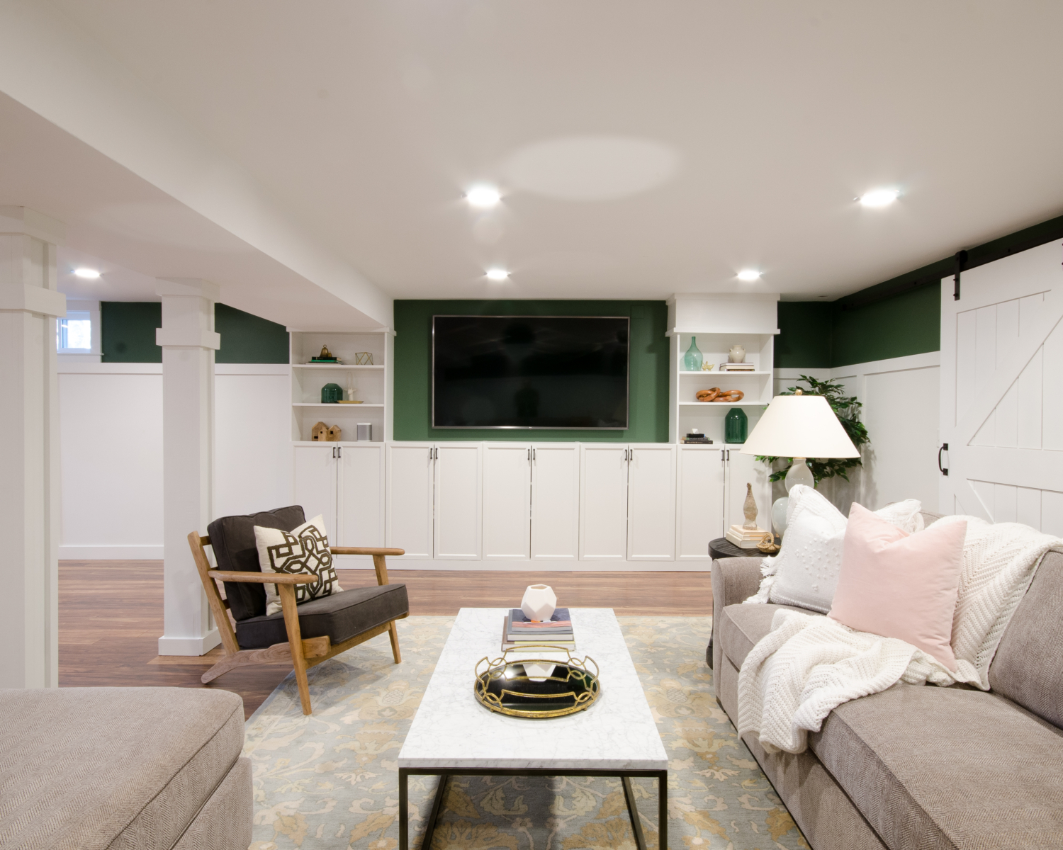 Finished basement family room sources for this space that perfectly marries style and family-friendly