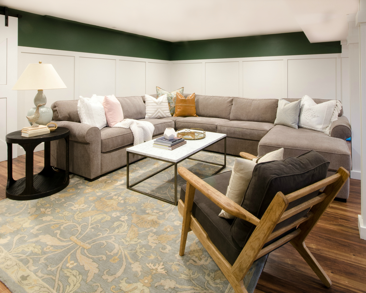 Finished basement family room sources for this space that perfectly marries style and family-friendly