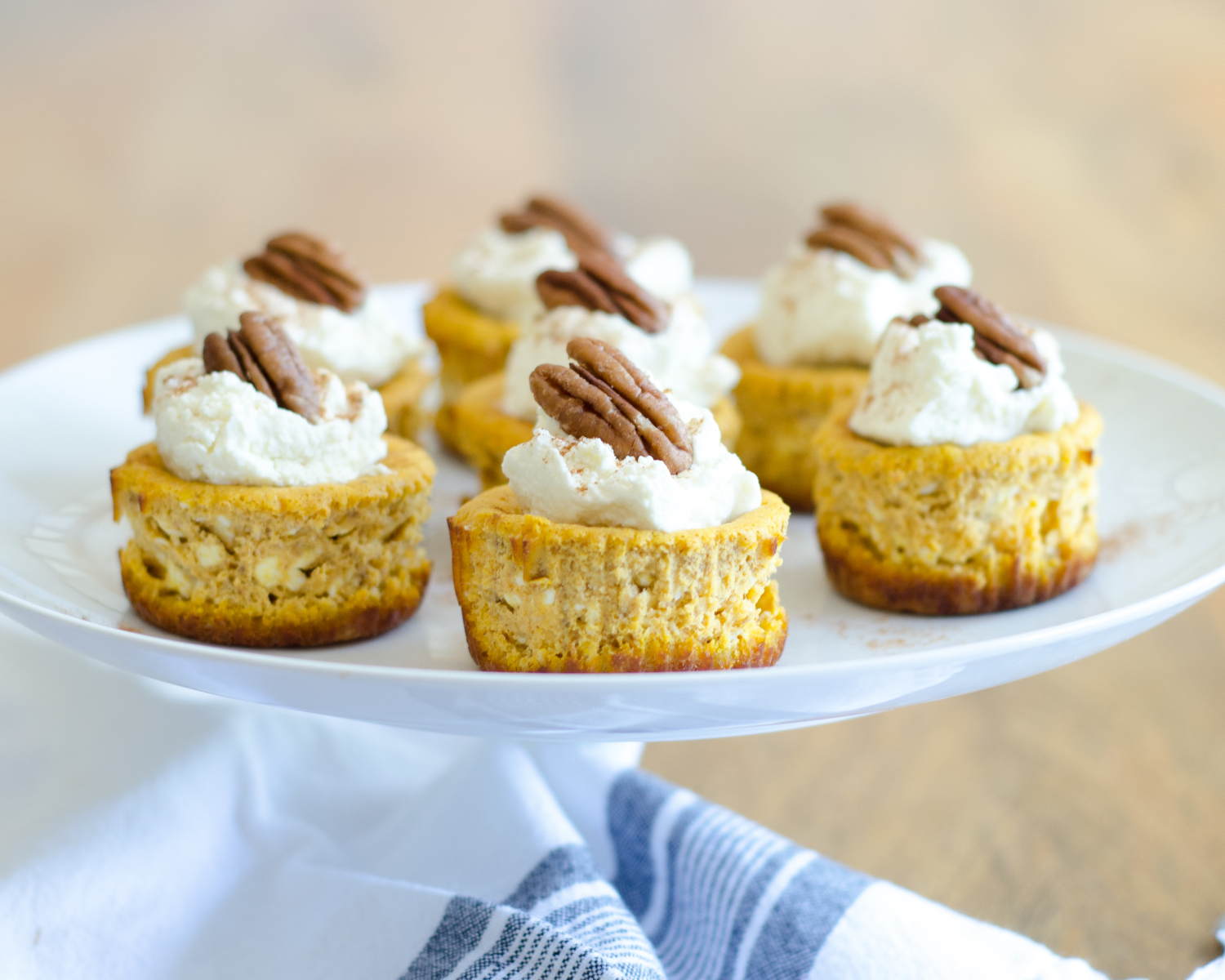 Gluten free and keto mini pumpkin cheesecakes are a perfect fall treat. All the pumpkin spice flavors you love and only 1.8 g of net carbs!