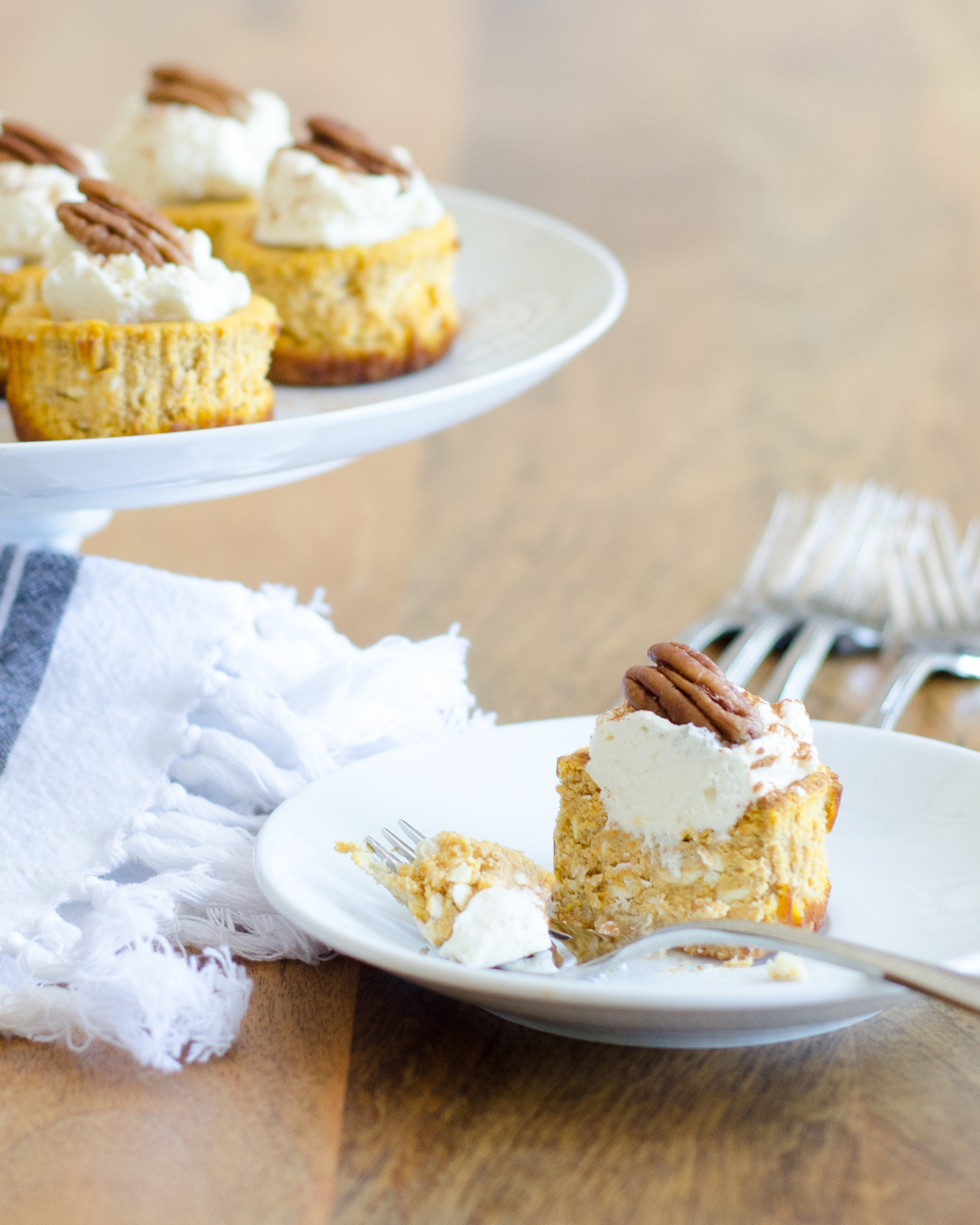 Gluten free and keto mini pumpkin cheesecakes are a perfect fall treat. All the pumpkin spice flavors you love and only 1.8 g of net carbs!