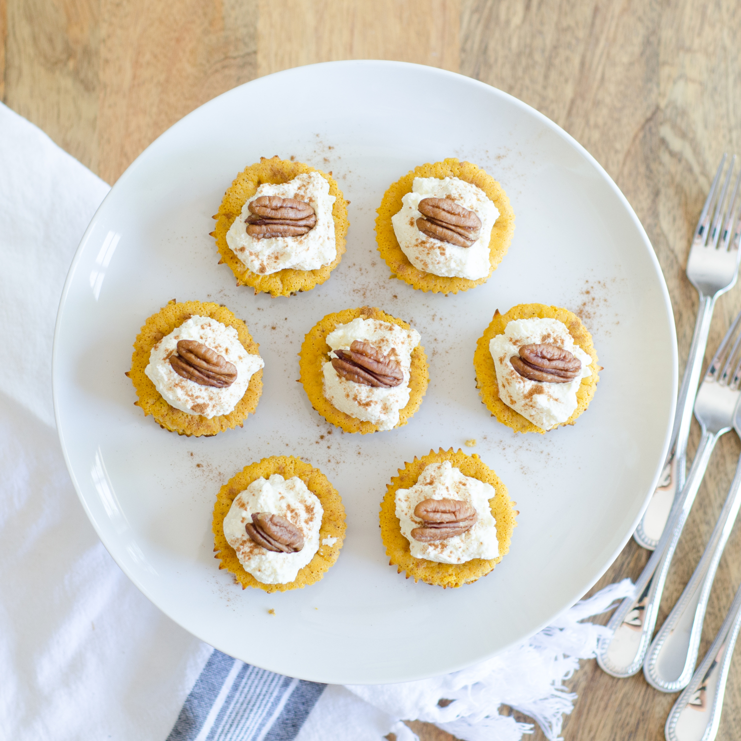 Gluten free and keto mini pumpkin cheesecakes are a perfect fall treat. All the pumpkin spice flavors you love and only 1.8 g of net carbs!