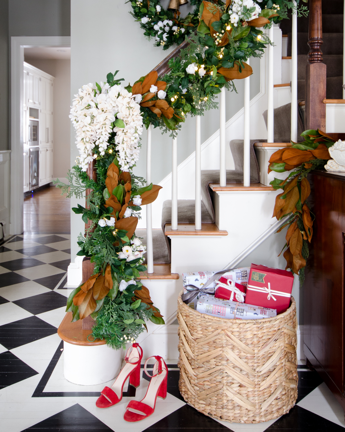 Christmas garland with magnolia and white flowers