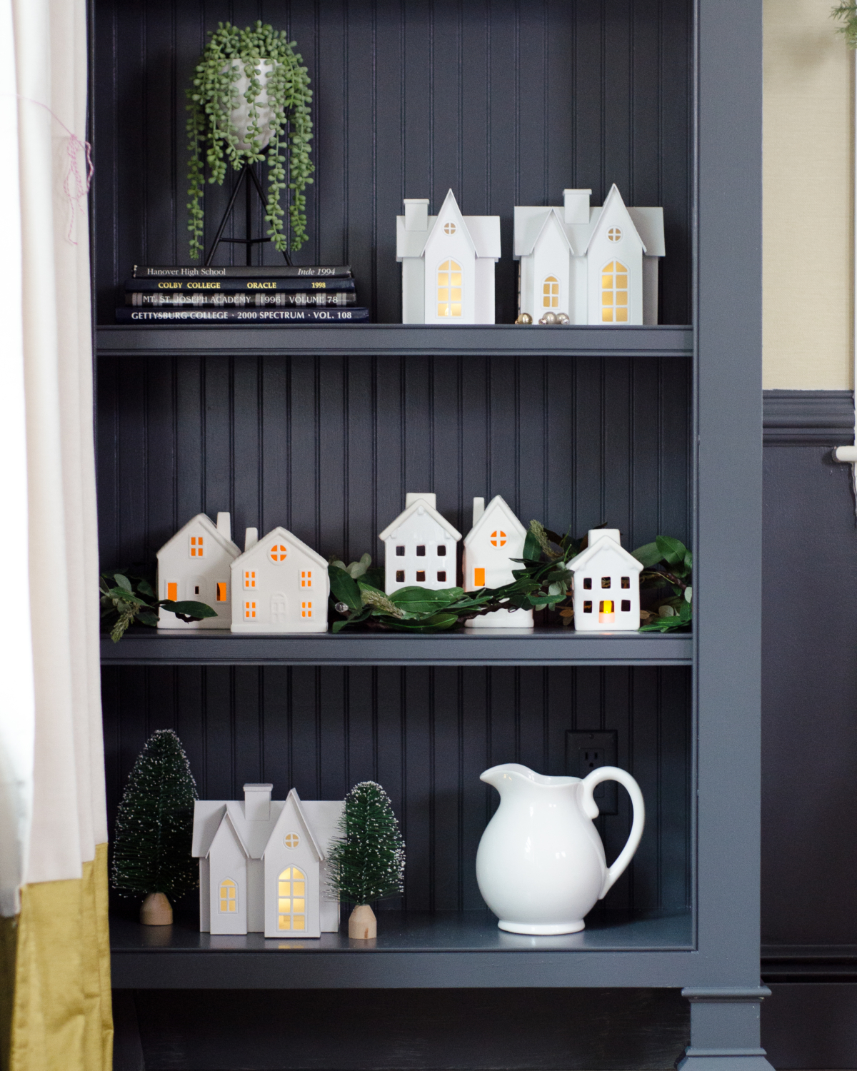 White Christmas houses, Christmas bookshelf styling