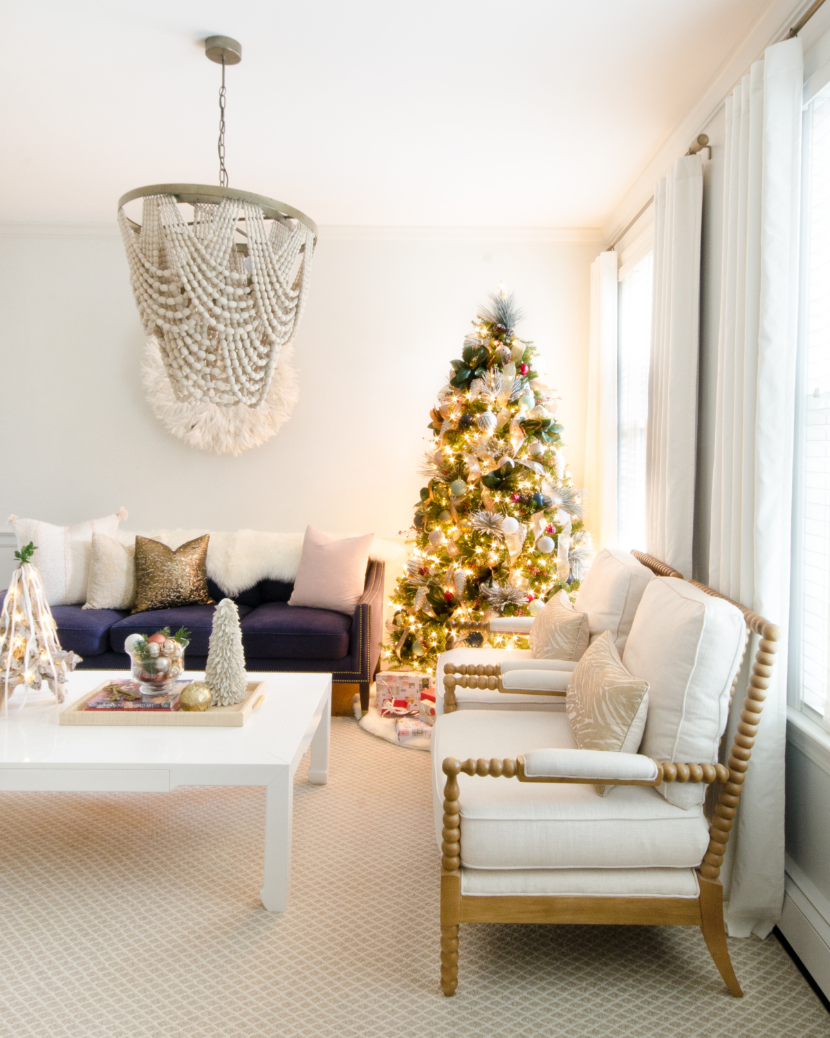 Neutral Christmas living room with white, blush, and cream