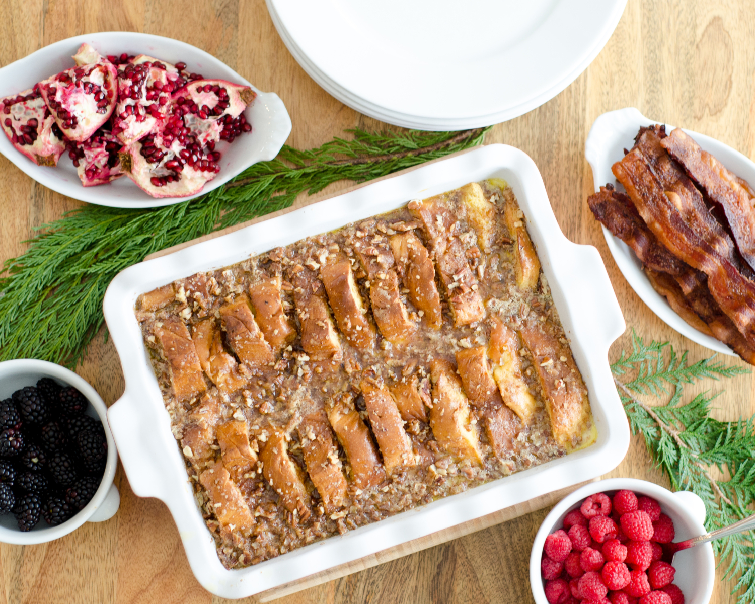 An easy and sinfully delicious overnight french toast recipe featuring eggnog, cinnamon, and pecans. Perfect for the holidays!