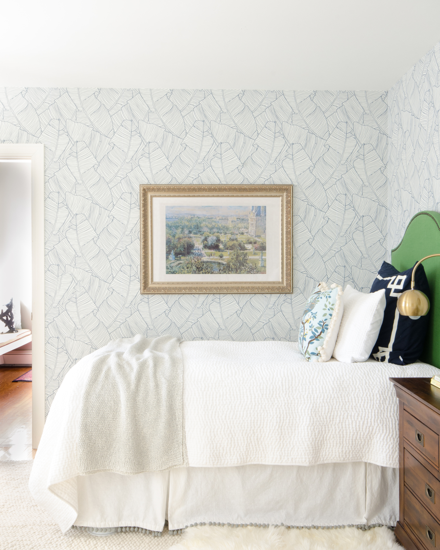 A traditional blue, green, and white bedroom with modern touches. Shows how to create a simple, pretty, and comfortable guest room on a budget!