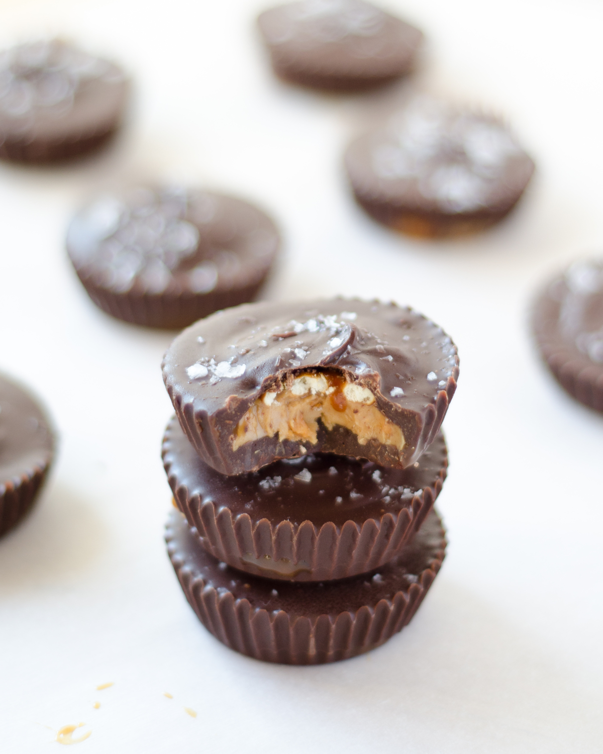 Recipe for the ultimate sweet and salty peanut butter cups filled with peanuts, peanut butter, caramel, and pretzels. A homemade Take 5 candy bar!