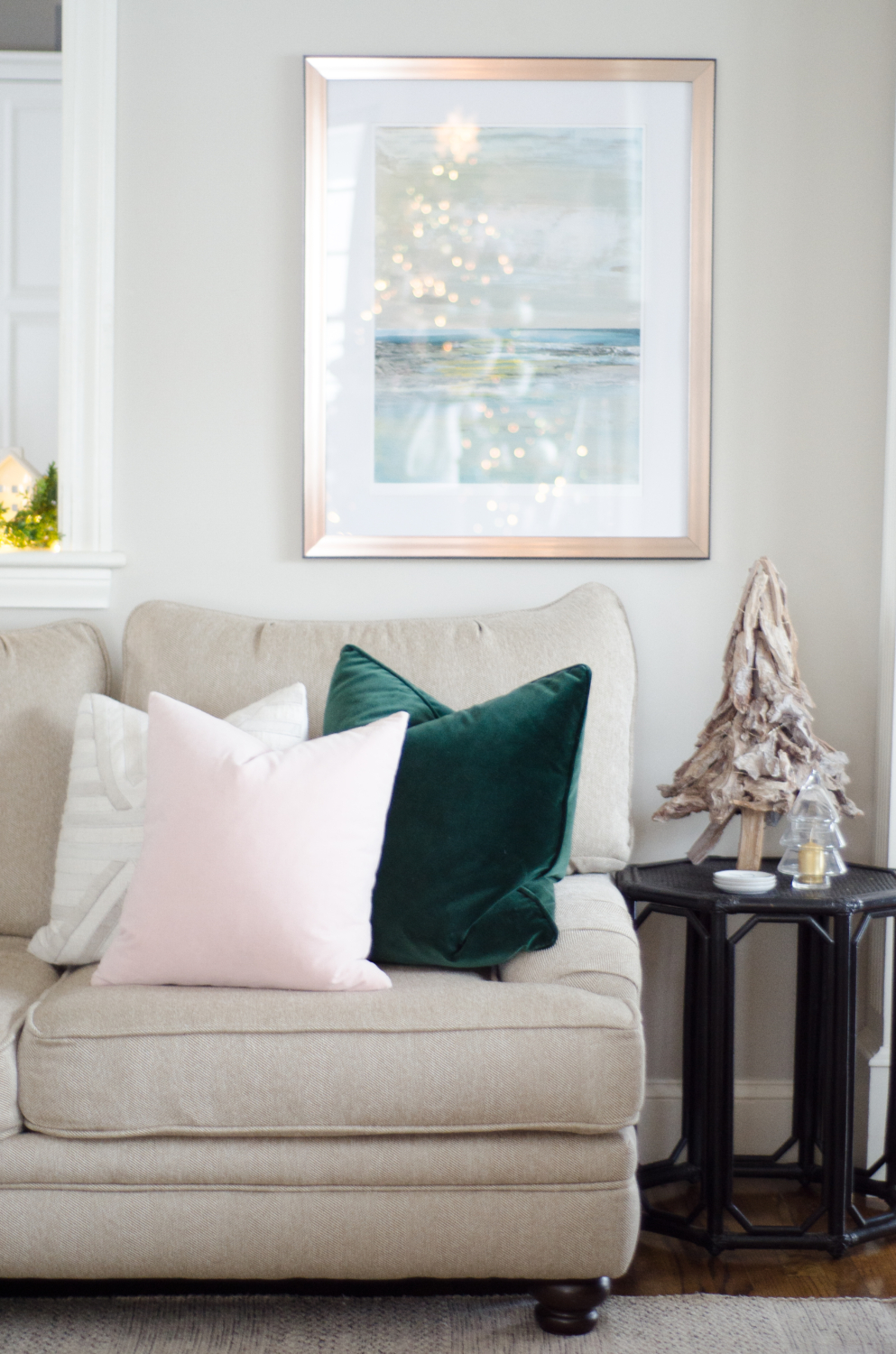 Understated, sophisticated Christmas color palette of beige, white, blush pink, and hunter green.