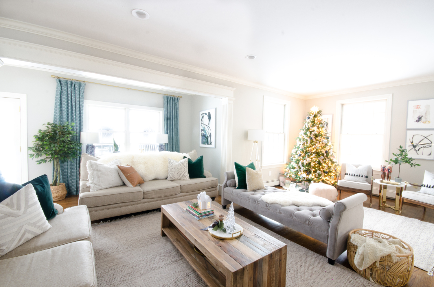 Christmas family room in beige, white, grey velvet, green velvet, and blush pink. Understated and cozy decorating ideas.