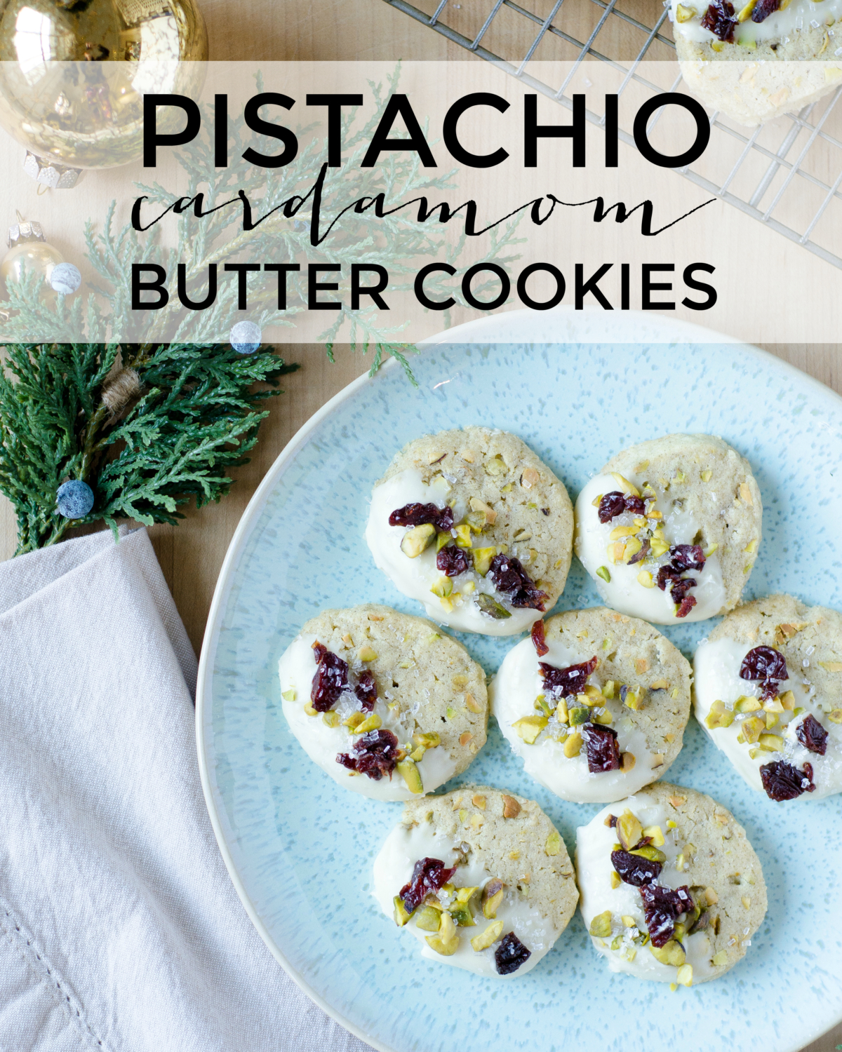 Pistachio cardamom butter cookies that are easy to make and taste nutty, creamy, and delicious. Perfect as a Christmas cookie with subtle red and green!